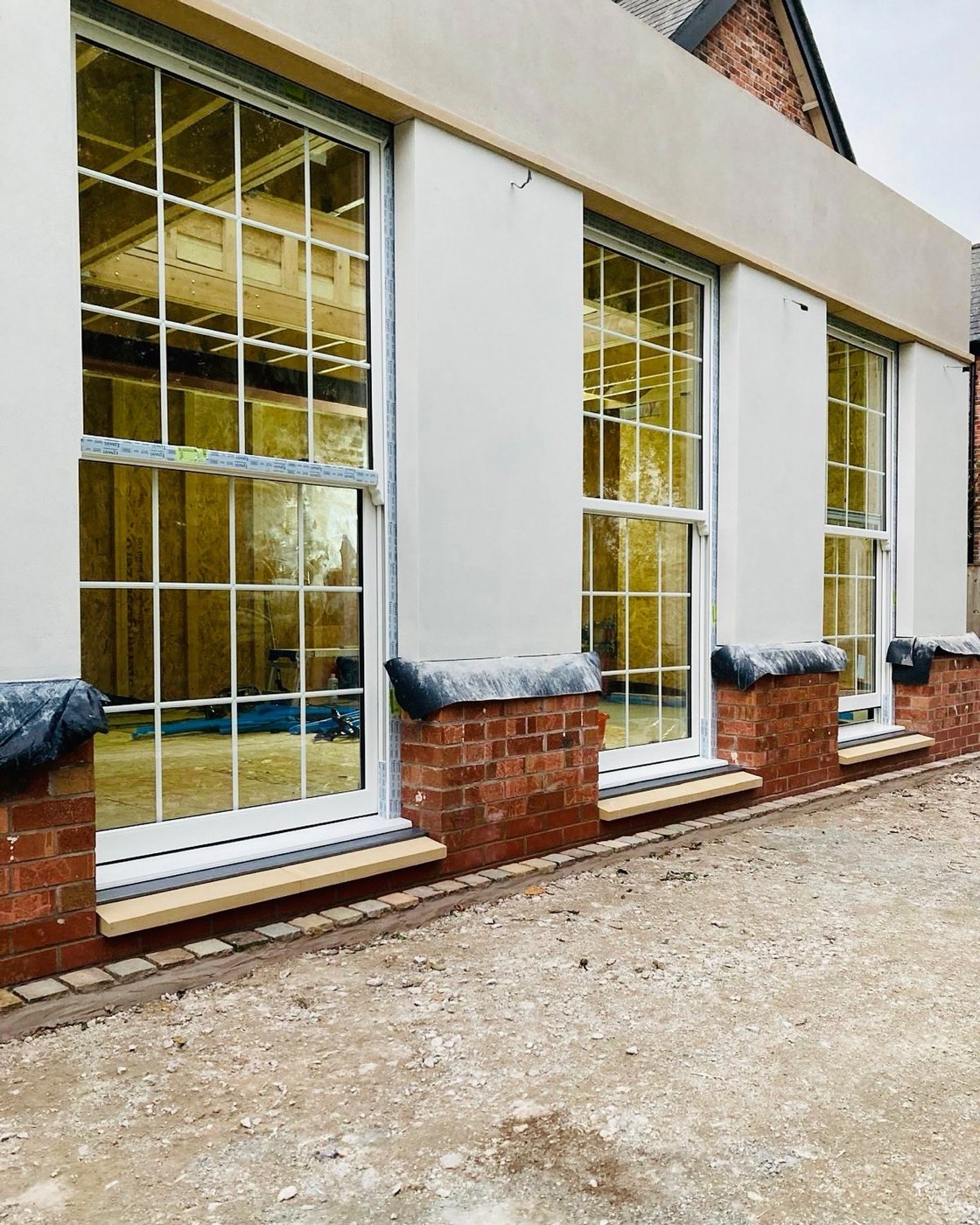 Rendered Elevation with Tall Casement Windows